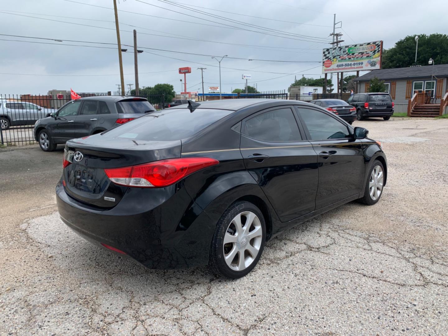 2012 Black Hyundai Elantra GLS A/T (KMHDH4AE3CU) with an 1.8L L4 DOHC 16V engine, Automatic transmission, located at 1830 North Belt Line Road, Irving, TX, 75061, (469) 524-0199, 32.834373, -96.993584 - Photo#3